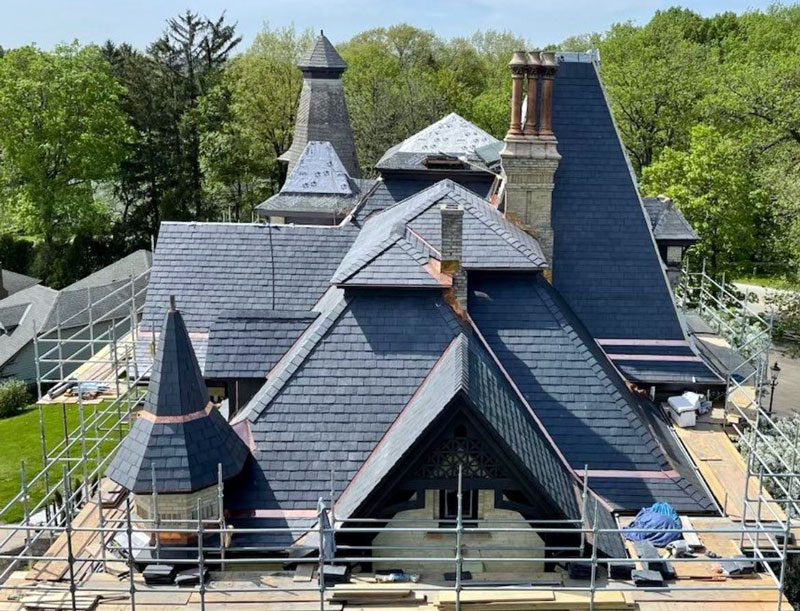 Heins roof installed after completing slate roof install introductory course.